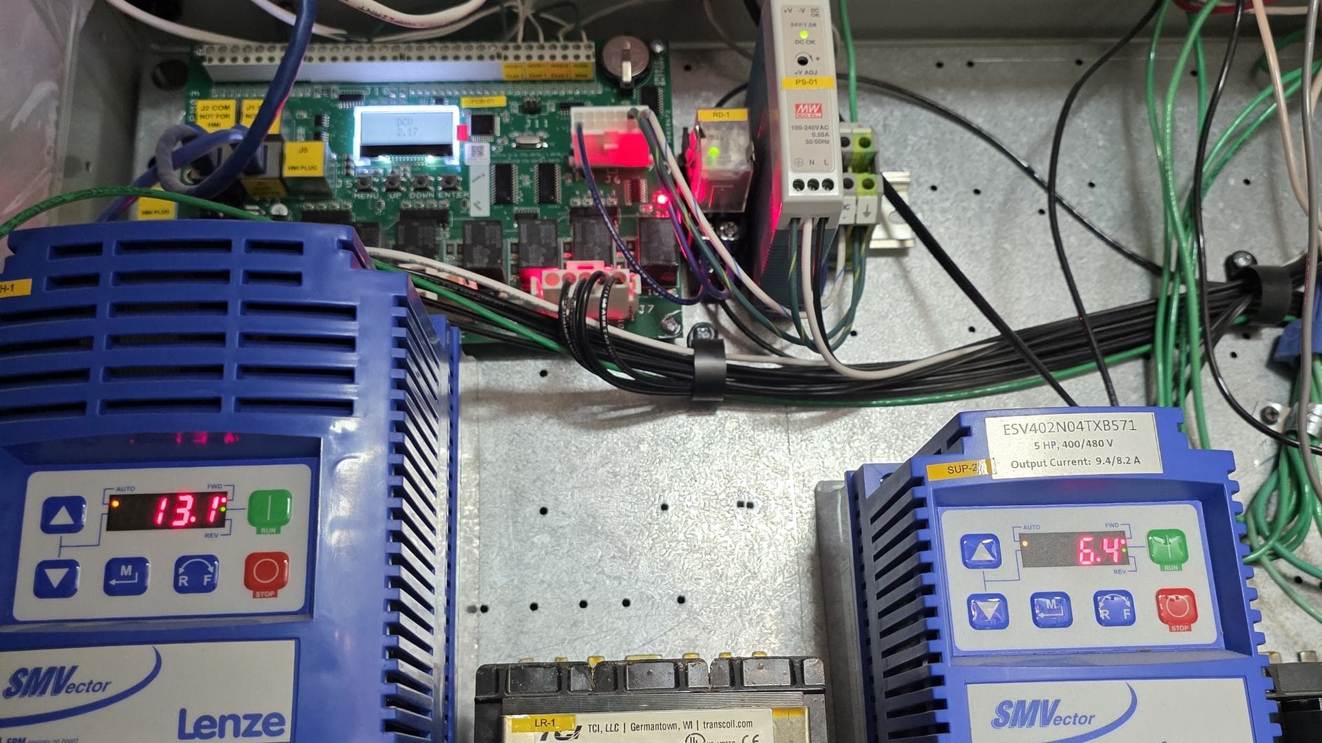 Inside a kitchen hood fan control panel: variable-frequency drives and the controller that set exhaust fan speeds